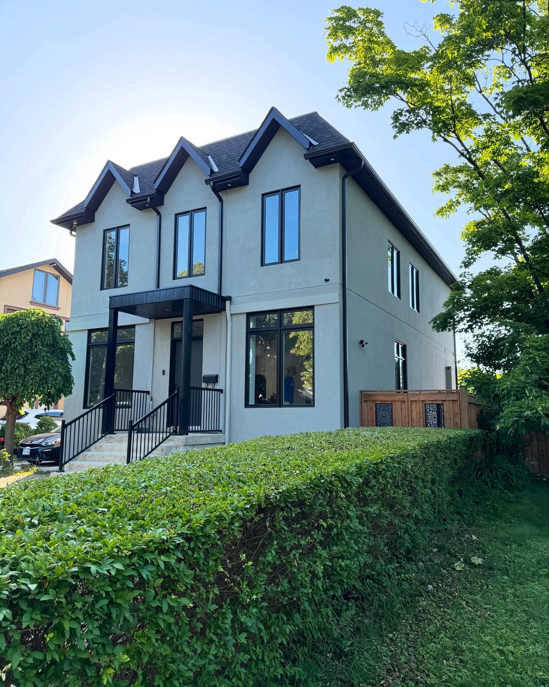 Completed stucco exterior on two-story home in Toronto
